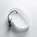 UMYWALKA-NABLATOWA-CERAMICZNA-OWALNA-RYFLOWANA-ELI-WH-490-BIALY_[111052]_1200.jpg