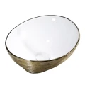 Umywalka-Nablatowa-Ceramiczna-Owalna-NOMA-SGL-Zlota-Szczotkowana-40-33-cm.jpg