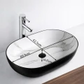 Umywalka-Nablatowa-Ceramiczna-Owalna-Anti-Wipe-DUOM-BLM-Czarny-Mat-Marmur-Maks-szerokosc-60-5-cm.jpg